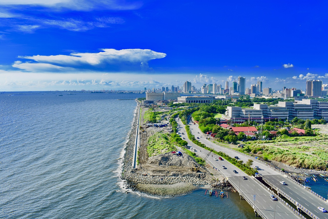 Flights to Manila (MNL) - Manila Bay skyline - book airline tickets