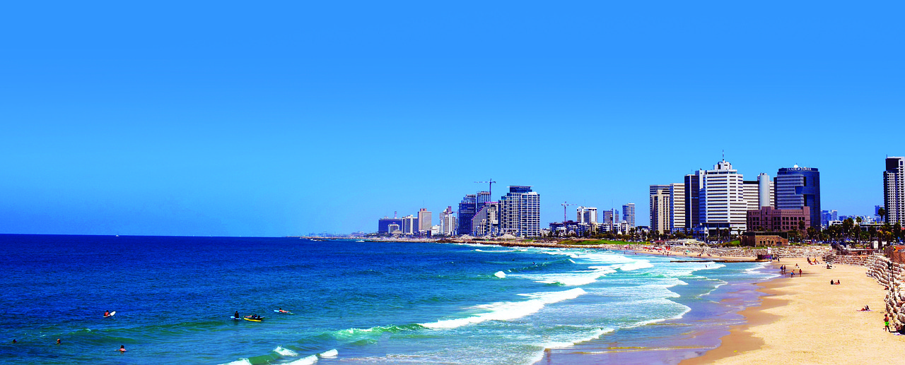 Flights to Tel Aviv (TLV) - Tel Aviv beach and skyline - book airline tickets
